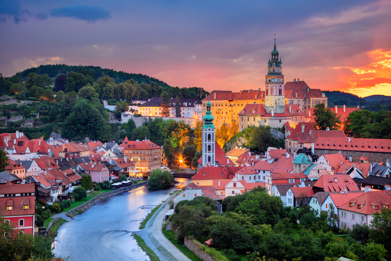 Aerial cityscape image of Cesky Krumlov, Czech Republic during summer sunset.